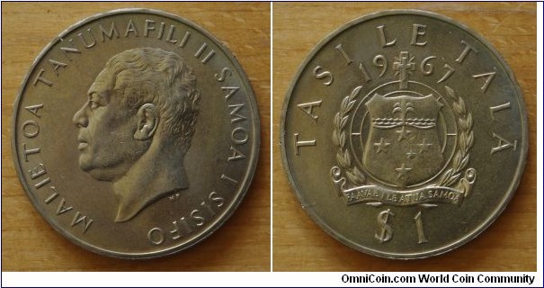 Samoa | 
1 Tālā, 1967 | 
39 mm, 27.5 gr. | 
Copper-nickel | 

Obverse: Chief Malietoa Tanumafili II facing left | 
Lettering: * MALIETOA TANUMAFILI II SAMOA I SISIFO |

Reverse: National Coat of Arms, denomination below, date above | 
Lettering: TASI TĀLĀ 1967 $1 |