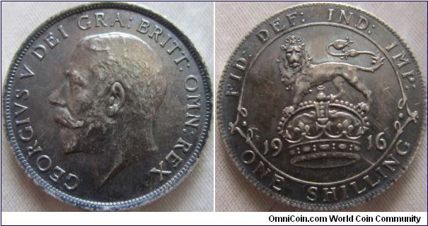 1916 shilling in EF, few scratches in the field on Obverse and light wear to the Moustache