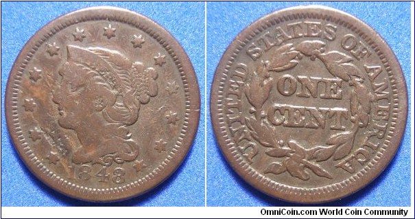 Large Cent with pre-strike planchett damage and post-mint  minor corrosion damage