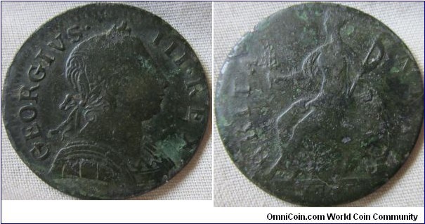 possibly a counterfeit halfpenny dated 1775, plenty of detail remains