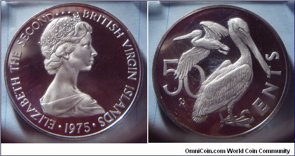 British Virgin Islands | 
50 Cents, 1975 | 
31.5 mm, 14.25 gr. | 
Copper-nickel | 

Obverse: Queen Elizabeth II facing right, date below | 
Lettering: • ELIZABETH THE SECOND••• BRITISH VIRGIN ISLANDS • 1975 |

Reverse: Brown Pelican, denomination left | 
Lettering: 50 CENTS |