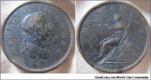 1807 penny, F grade with a nasty reverse dent