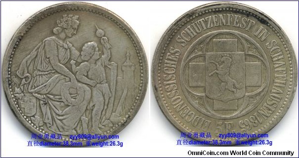 1865 Swiss Federal Shooting Festival Thaler 5 Francs Silver Coin. Inscription or Legends: Reverse: EIDGENOSSISCHES SCHUTZENFEST IN SCHAFFHAUSEN 1865, 5 Fr. ( Translation: Federal shooting festival in Schaffhausen 1865 – 5 francs)