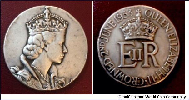 1953 UK Queen Elizabeth II Coronation Medal. Silver: 33MM./23.4 gms.
Obv: Crowned bust of Queen Elizabeth II to left. Rev: Crown above EIIR. Legend QUEEN ELIZABETH.II. CROWNED 2nd JUNE 1953.