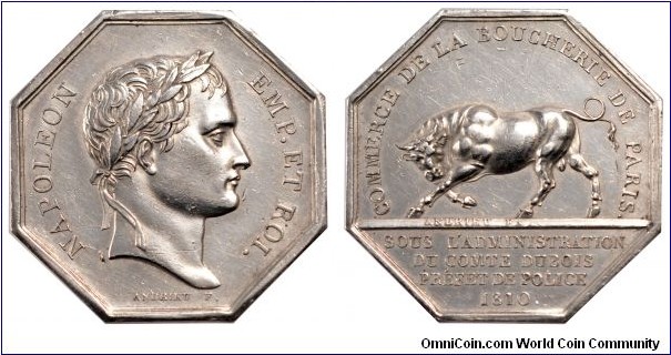 1810 France Napoleon Commerce de la boucherie de Paris Hexigon Medal by Andrieu. Silver 17.04 gms.
Obv: Bust of Napoleon to right. Legend NAPOLEON EMP.ET.ROI. Signed ANDRIEU. Rev: A strong bull in center. Legend COMMERCE DE LA BOUCHERIE DE PARIS. SIGNED andrieu f. exergue SOUS L'ADMINISTRATION DU COMTE DUZOIS PREFET DE POLICK 1810.
