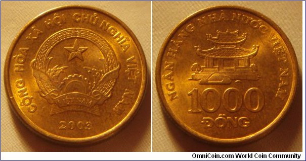 Vietnam | 
1,000 Đồng, 2003 | 
19.75 mm, 3.7 gr. | 
Brass plated Steel | 

Obverse: National Coat of Arms, date below | 
Lettering: CỘNG HÒA XÃ HỘI CHỦ NGHĨA VIỆT NAM 2003 | 

Reverse: Water Temple, denomination below | 
Lettering: NGÂN HÀNG NHÀ NƯỚC VIỆT NAM 1000 ÐỒNG |