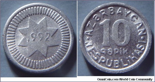 Azerbaijan | 
10 Qəpik, 1992 | 
18.6 mm, 1.05 gr. | 
Aluminium | 

Obverse: Star with date inside | 
Lettering: 1992 | 

Reverse: Denomination | 
Lettering: • AZƏRBAYCAN • RESPUBLİKASI 10 qəpik |