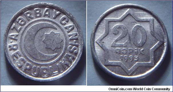 Azerbaijan | 
20 Qəpik, 1993 – coin strike, turned 10 o'clock | 
20.1 mm, 1.15 gr. | 
Aluminium | 

Obverse: Crescent and star | 
Lettering: • AZƏRBAYCAN • RESPUBLİKASI | 

Reverse: Star, denomination inside, date below | 
Lettering: 20 qəpik 1993 |