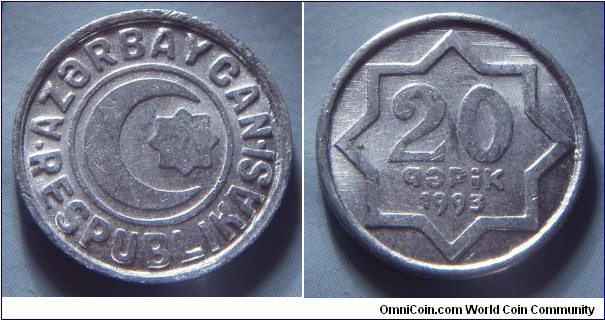 Azerbaijan | 
20 Qəpik, 1993 – coin strike, turned 10 o'clock | 
20.1 mm, 1.15 gr. | 
Aluminium | 

Obverse: Crescent and star | 
Lettering: • AZƏRBAYCAN • RESPUBLİKASI | 

Reverse: Star, denomination inside, date below | 
Lettering: 20 qəpik 1993 |