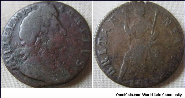 1697 farthing, mid grade some old verdegris but otherwise a nice colour and grade of its type, not an E for L though, that is just some lumps