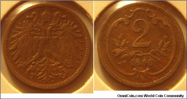 Austria-Hungary | 
2 Heller, 1899 | 
19 mm, 3.35 gr. | 
Bronze | 

Obverse: Double-headed eagle, symbolizing the Austro-Hungarian Empire | 

Reverse: Denomination, date below | 
Lettering: 2 1899 |