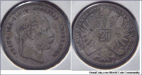 Austria-Hungary | 
20 Kreuzer, 1870 | 
21 mm, 2.67 gr. | 
Silver (.500) | 

Obverse: Emperor Franz Joseph I./I. Ferenc József facing right | 
Lettering: FRANC • IOS • I • D • G • AVSTRIAE IMPERATOR | 

Reverse: Double-headed eagle, symbolizing the Austro-Hungarian Empire, denomination in middle, date upper left | 
Lettering: HVNGAR • BOHEM • GAL• LOD • ILL • REX A • A • 1870 |