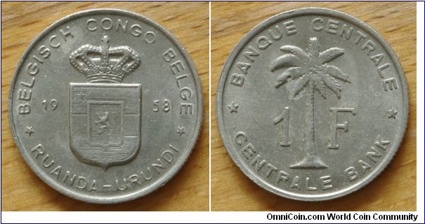 Ruanda-Urundi | 
1 Franc, 1958 | 
22.1 mm, 1.4 gr. | 
Aluminium | 

Obverse: Crowned Coat of Arms divide date | 
Lettering: * BELGISCH CONGO BELGE * 16 58 RUANDA-URUNDI  | 

Reverse: Oil Palm Tree divide denomination | 
Lettering: * BANQUE CENTRALE * 1 F CENTRALE BANK |