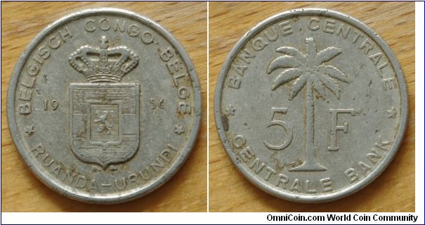 Ruanda-Urundi | 
5 Francs, 1956 | 
26.2 mm, 2.2 gr. | 
Aluminium | 

Obverse: Crowned Coat of Arms divide date | 
Lettering: * BELGISCH CONGO BELGE * 16 56 RUANDA-URUNDI  | 

Reverse: Oil Palm Tree divide denomination | 
Lettering: * BANQUE CENTRALE * 5F CENTRALE BANK |