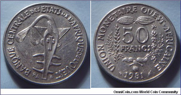 West African States | 
50 Francs, 1981 | 
22 mm, 5 gr. | 
Copper-nickel | 

Obverse: Sawfish, symbol of the Central Bank of West African States (BCEAO) | 
Lettering: BANQUE CENTRALE ETATS DE L'AFRIQUE DE L'OUEST | 

Reverse: Agricultural produce, denomination, date below | 
Lettering: UNION MONETAIRE OUEST-AFRICAINE 50 FRANCS 1981 |