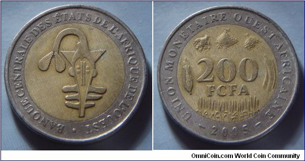 West African States | 
200 Francs, 2005 | 
24.5 mm, 6.8 gr. | 
Bi-metallic: Brass centre in Copper-nickel ring | 

Obverse: Sawfish, symbol of the Central Bank of West African States (BCEAO) | 
Lettering: BANQUE CENTRALE ÉTATS DE L'AFRIQUE DE L'OUEST | 

Reverse: Agricultural produce, denomination and date below | 
Lettering: – UNION MONÉTAIRE OUEST-AFRICAINE – 200 FCFA 2005 |