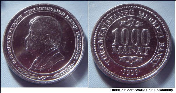 Turkmenistan | 
1,000 Manat, 1999 | 
24 mm, 4.87 gr. | 
Nickel clad Steel | 

Obverse: President Saparmyrat Nyýazow facing left | 
Lettering: SAPARMYRAT NYYAZOW TÜRKENISTANYÑ ILKINJI PREZIDENTI | 

Reverse: Denomination, date below | 
Lettering: TÜRKMENISTANYÑ MERKEZI BANKY 1000 MANAT 1999 |