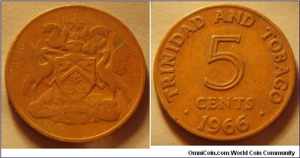 Trinidad & Tobago | 
5 Cents, 1966 | 
21.15 mm, 3.25 gr. | 
Bronze | 

Obverse: National Coat of Arms | 

Reverse: Denomination, date below | 
Lettering: • TRINIDAD AND TOBAGO • 5 CENTS 1966 |