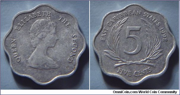 East Caribbean States | 
5 Cents, 1992 | 
23.1 mm, 1.31 gr. | 
Aluminium | 

Obverse: Queen Elizabeth II facing right | 
Lettering: QUEEN ELIZABETH THE SECOND | 

Reverse: Denomination flanked by palmtree fronds, date right | 
Lettering: EAST CARIBBEAN STATES 1992 5 FIVE CENTS |