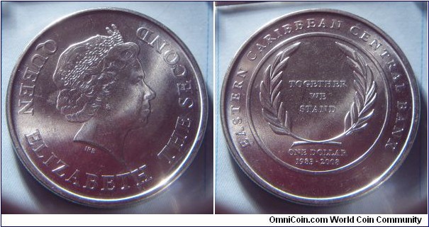 East Caribbean States | 
1 Dollar, 2008 | 
30 mm, 7.98 gr. | 
Copper-nickel |  

Obverse: Queen Elizabeth II facing right | 
Lettering: QUEEN ELIZABETH THE SECOND | 

Reverse: flanked by palmtree fronds, denomination below, date bottom | 
Lettering: EAST CARIBBEAN CENTRAL BANK TOGETHER WE STAND ONE DOLLAR 1983 - 2008 |