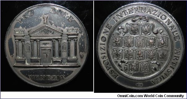 1800 o j Italy Venice Art International Exposition Medal. Plated Bronze: 58MM,/86 gms.
Obv: Fecade of Art Building.Legend PRO ARTE VENEZIA. Obv: Shields of 12 Countries participate in the Exposition with ribbon. Legend ESPOSIZION INTERNAZIONALE ARTISTICA. 
