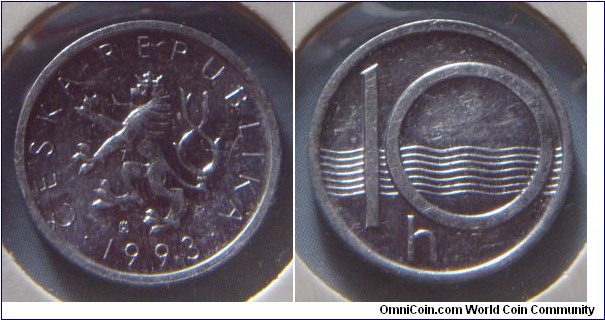 Czech Republic | 
10 Haléřů, 1993 | 
15.5 mm, 0.6 gr. | 
Aluminium |  

Obverse: Czech Lion, date below | 
Lettering: • ČESKÁ REPUBLIKA • 1993 | 

Reverse: Stylized river, denomination in front | 
Lettering: 10 h |