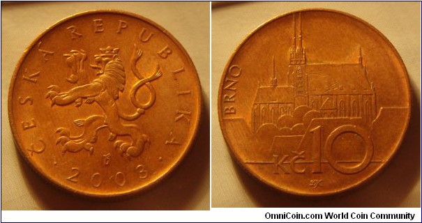 Czech Republic | 
10 Korun, 2003 | 
24.5 mm, 7.62 gr. | 
Copper plated Steel |  

Obverse: Czech Lion, date below | 
Lettering: • ČESKÁ REPUBLIKA • 2003 | 

Reverse: Petrov national monument in Brno, denomination below | 
Lettering: BRNO Kč 10 |