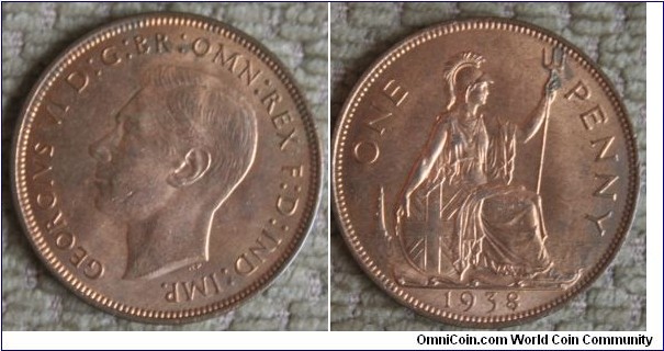 Penny with a few carbon marks on rev: 2 oclock 
