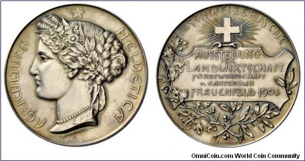 1903 Swiss Fraunefeld Agricultura Heldetica Medal by Durussel. Silver 50MM/52.93 gm.
Obv: Ceres goddess of agriculture to right. Legend HELUETICA AGRICULTURA. Rev: The Shield & Laural.
