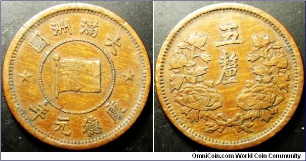 China Manchukuo 1934 5 li. Scratched. Weight: 3.45g. 