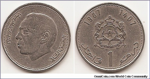 1 Dirham -AH1407-
Y#88
6.0000 g., Copper-Nickel, 24 mm.Obv : Head leftRev: Crowned arms with supporters, value belowEdge: Reeded