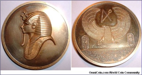 1922-1972 Egypt 50th Anniversary of the Discovery of the Tomb of Tutankhamun Medal strunk by Toye, Kenning & Spencer Ltd., 22ct Gold on Silver: 50MM./ 49 gm.,
Obv: Mask of Tutankhamun. Rev: Symbols of ancient Egypt. Exergue: 50TH ANNIVERSARY OF THE DISCOVERY OF THE TOMB OF TUTANKHAMUN IN THE VALLEY OF THE KINGS AT THEBES EGYPT. BY HOWARD CARTER & LORD CARNARVON 26TH NOV. 1922.
