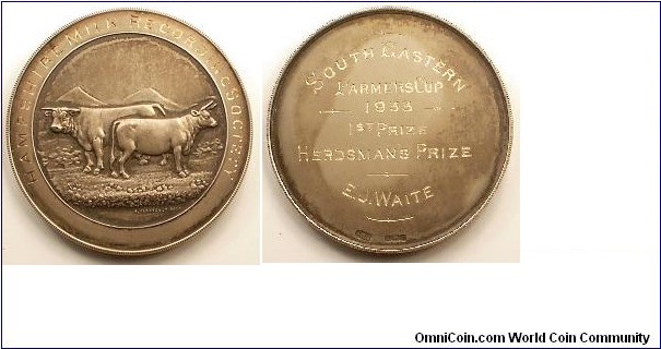 1933 UK Hampshire Milk Recording Association Medal. Silver: 51MM
Obv: A cow & a bull. Rev: An inscription.

