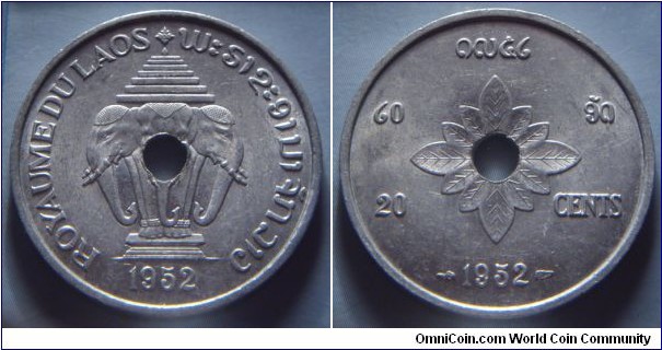 French Laos | 
20 Cents, 1952 | 
27 mm, 2.23 gr. | 
Aluminium | 

Obverse: National Coat of Arms, date below | 
Lettering: ROYAUME DU LAOS ພະຣາຊະອານາຈັກລາວ | 

Reverse: Flower surrounding centre hole, denomination in Lao and French, date below | 
Lettering: ໑໙໕໒ ໒໐ ອັດ 20 CENTS 1952 |