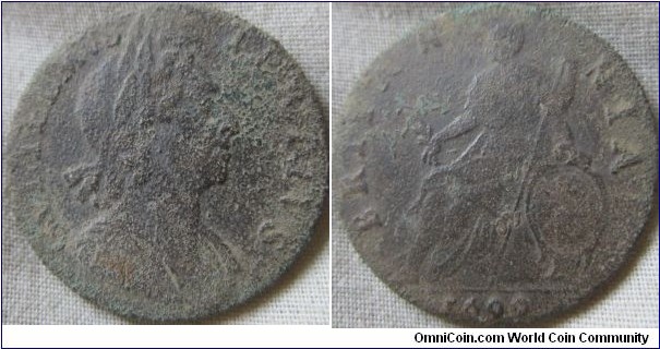 1699 halfpenny no stop on Reverse, great detail but damage from being in the ground