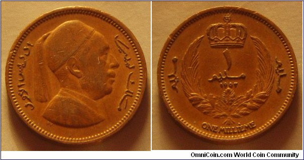 Kingdom of Libya | 
1 Millième, 1952 | 
18 mm, 3 gr. | 
Bronze | 

Obverse: King Idris I facing right | 
Lettering: إدريس الأول‎ ملك ليبيا | 

Reverse: Crown above wreath, denomination, date below | 
Lettering: مليم مليم ١ مليم ١٩٥٢  ONE MILLIÈME |