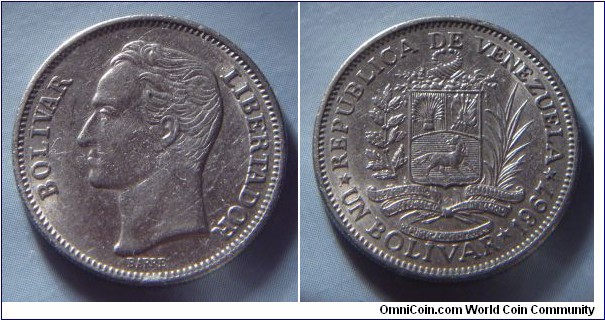 Venezuela | 
1 Bolívar, 1967 | 
23 mm, 5 gr. | 
Nickel | 

Obverse: Simón Bolívar facing left | 
Lettering: BOLÍVAR LIBERTADOR | 

Reverse: National Coat of Arms, date and denomination below | 
Lettering: * REPÚBLICA DE VENEZUELA * UN BOLÍVAR * 1967 | 