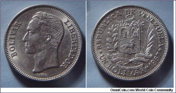 Venezuela | 
1 Bolívar, 1967 | 
23 mm, 5 gr. | 
Nickel | 

Obverse: Simón Bolívar facing left | 
Lettering: BOLÍVAR LIBERTADOR | 

Reverse: National Coat of Arms, date and denomination below | 
Lettering: * REPÚBLICA DE VENEZUELA * UN BOLÍVAR * 1967 | 