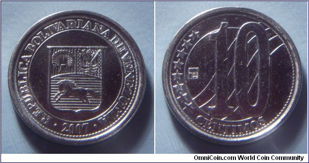 Venezuela | 
10 Céntimos, 2007 | 
18 mm, 2.62 gr. | 
Nickel plated Steel | 

Obverse: National Coat of Arms, date below | 
Lettering: • REPÚBLICA BOLIVARIANA DE VENEZUELA • 2007 | 

Reverse: Denomination | 
Lettering: ******** 10 CÉNTIMOS |
