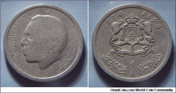Morocco | 
1 Dirham, 1974 (1394) | 
24 mm, 6 gr. | 
Copper-nickel | 

Obverse: King Hassan II facing left | 
Lettering: المملكة المغربية الحسن الثاني |

Reverse: National Coat of Arms, date above, denomination below | 
Lettering: 1974 1394 درهما 1 واحد |