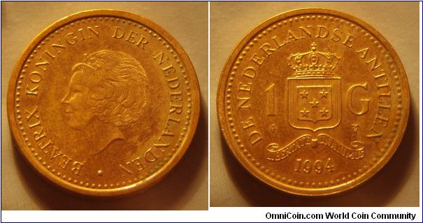 Netherlands Antilles | 
1 Gulden, 1994 | 
24 mm, 6 gr. | 
Aureate Steel | 

Obverse: Queen Beatrix facing left | 
Lettering: • BEATRIX KONINGIN DER NEDERLANDEN | 

Reverse: National Coat of Arms divides denomination, date below | 
Lettering: DE NEDERLANDSE ANTILLEN 1 G 1994 |