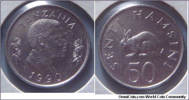 Tanzania | 
50 Senti, 1990 | 
20.9 mm, 4 gr. | 
Nickel clad Steel | 

Obverse: Second president, Ali Hassan Mwinyi, facing right flanked by flowers, date below | 
Lettering: TANZANIA 1990 | 

Reverse: Rabbit facing left, denomination below | 
Lettering: SENTI HAMSINI 50 |