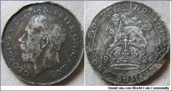 2934 shilling, decent detail, but bad edge damage