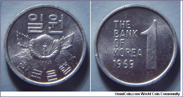 South Korea | 
1 Won, 1969 | 
17.2 mm, 0.73 gr. | 
Aluminium | 

Obverse: Rose of Sharon, South Korea national flower, denomination above | 
Lettering: 일원 한국은행 | 

Reverse: Denomination, date left | 
Lettering: THE BANK OF KOREA 1969 1 |