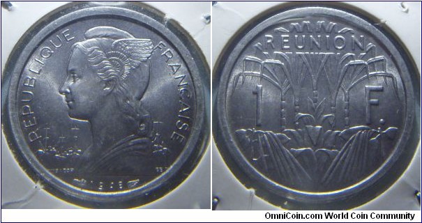 Réunion | 
1 Franc, 1948 | 
23 mm, 1.4 gr. | 
Aluminium | 

Obverse: Winged liberty facing left, date below | 
Lettering: REPUBLIQUE FRANÇAISE | 

Reverse: Sugar cane plants divide denomination | 
Lettering: REUNION 1 F. |