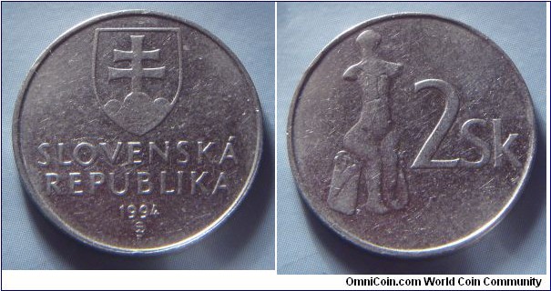 Slovakia | 
2 Koruny, 1994 | 
22.5 mm, 4.4 gr. | 
Nickel clad Steel | 

Obverse: National Coat of Arms, date below | 
Lettering: SLOVENSKÁ REPUBLIKA 1994 | 

Reverse: Earthen sculpture of the sitting Venus (Venus of Nitriansky Hrádok), denomination right | 
Lettering: 2 Sk |