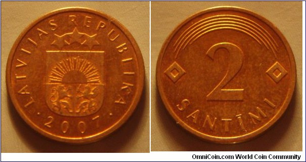Latvia | 
2 Santīmi, 2007 | 
17 mm, 1.9 gr. | 
Copper-clad Steel | 

Obverse: Small Coat of Arms, date below | 
Lettering: • LATVIJAS REPUBLIKA • 2007 | 

Reverse: Denomination | 
Lettering: 2 SANTĪMI |