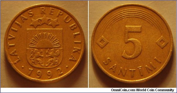 Latvia | 
5 Santīmi, 1992 | 
18.5 mm, 2.5 gr. | 
Nickel-brass | 

Obverse: Small Coat of Arms, date below | 
Lettering: • LATVIJAS REPUBLIKA • 1992 | 

Reverse: Denomination | 
Lettering: 5 SANTĪMI |