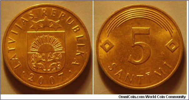 Latvia | 
5 Santīmi, 2007 | 
18.5 mm, 2.5 gr. | 
Nickel-brass | 

Obverse: Small Coat of Arms, date below | 
Lettering: • LATVIJAS REPUBLIKA • 2007 | 

Reverse: Denomination | 
Lettering: 5 SANTĪMI |