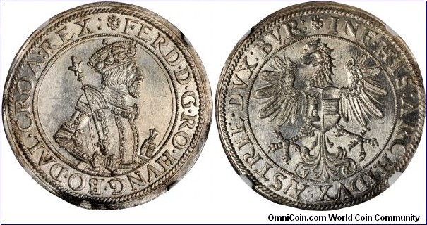 Taler of Ferdinand I (1521-64), Holy Roman Emperor from 1558-1564. Roller dies struck at Hall between 1573 and 1576. This issue was struck posthumously by his son (Ferdinand II) after Ferdinand I's death. All coins struck during Ferdinand I's lifetime were hammered strikes. Following the death of Ferdinand I, Ferdinand's eldest son, the new Emperor Maximilian II allowed his brother, Archduke Ferdinand II, to utilize an older coinage law that mandated the image of the old Emperor, Ferdinand I. The Hall mint was using roller presses by that time. Since this was a coin actually of Ferdinand II, as Archduke, even though his father was shown on the obverse, Ferdinand II had to use the Archduke (single-headed eagle) reverse rather than the double headed eagle of an Emperor. Unbelievable luster and strike for an almost 500-year old coin. NGC MS65 